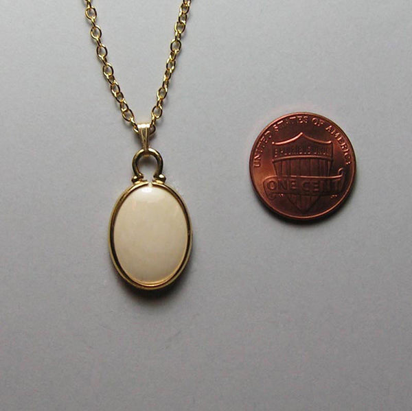 mammoth ivory and gold-filled pendant