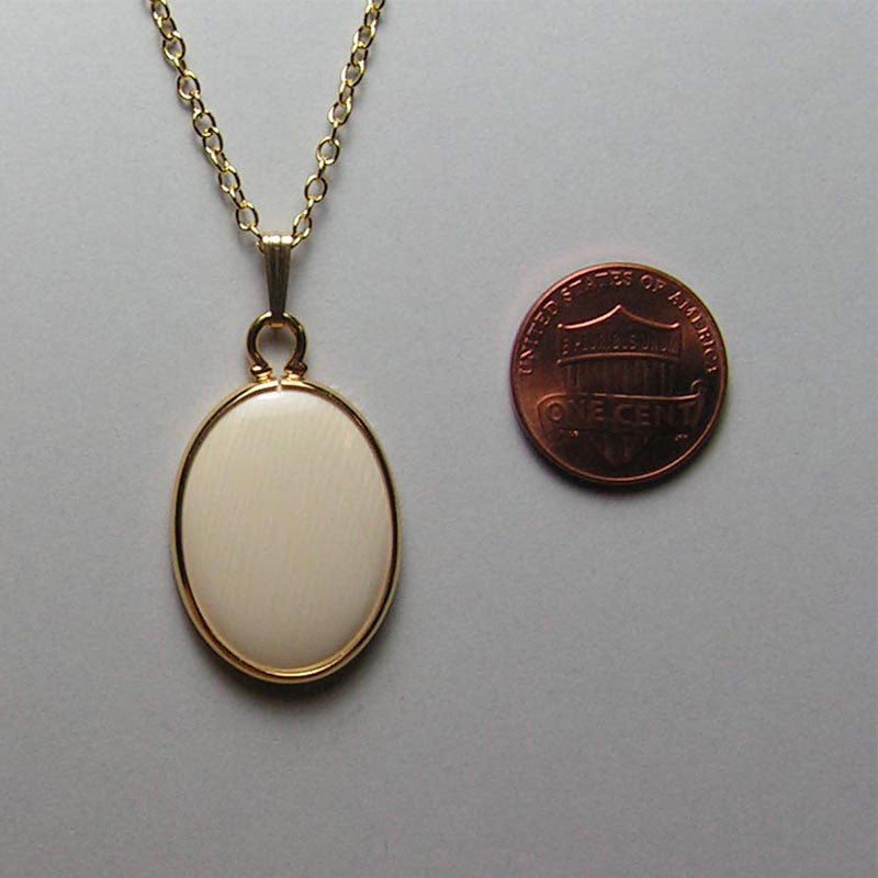 mammoth ivory and gold-filled pendant