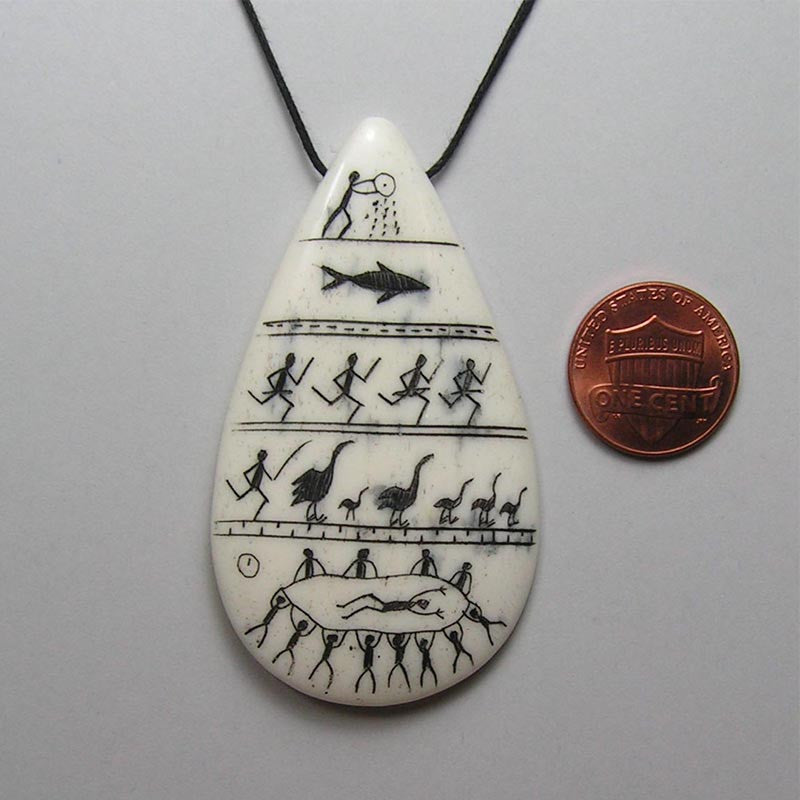 scrimshawed pendant